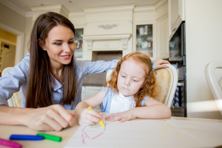 Babysitter playing with children